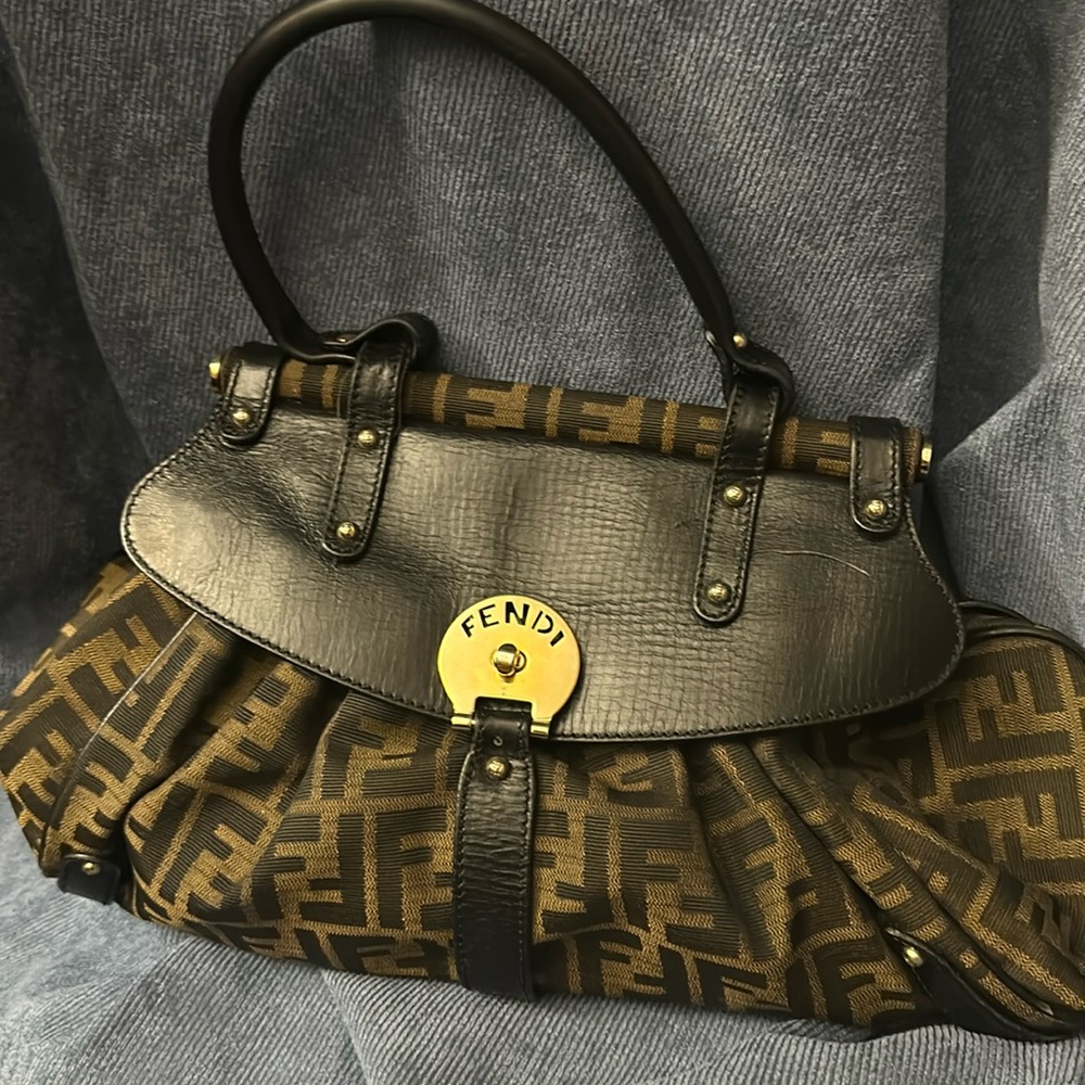 classy bag get lots of compliments but i only use one of many